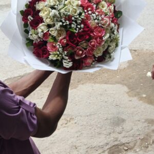 Mixed Red, White, and Pink Rose Bouquet in White Fan Wrap