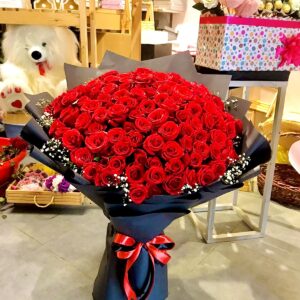 Red Roses & Baby Breath Bouquet In Black Wrap
